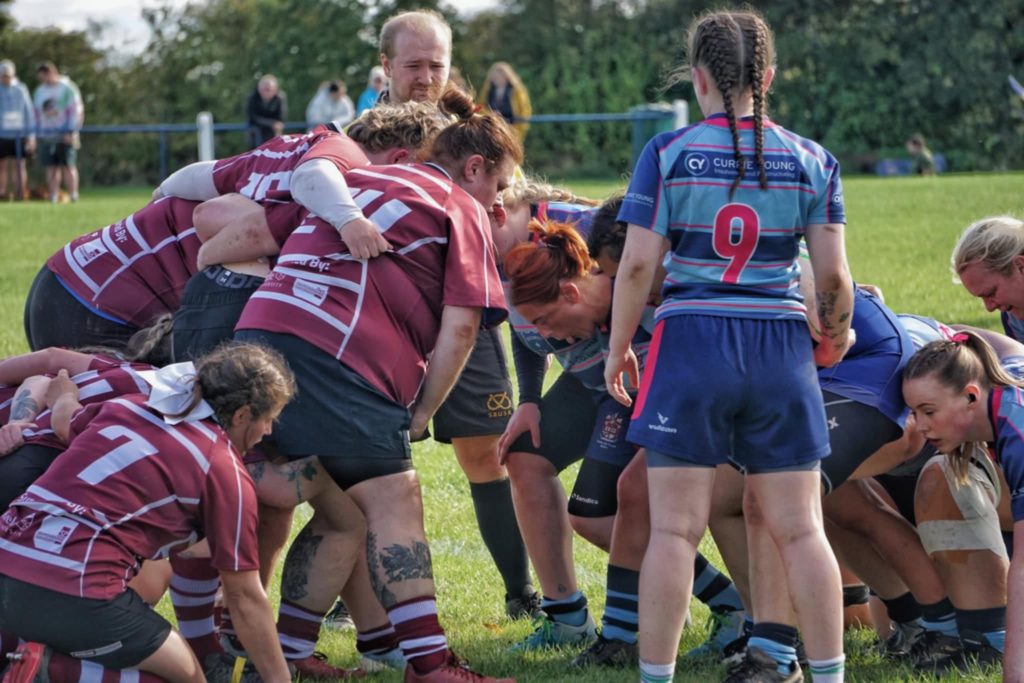 Women’s rugby scrum in custom rugby shirts during Newcastle v Stoke match