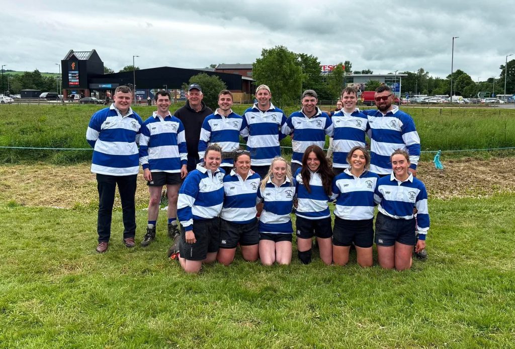 Callander and District Young Farmers Club tug of war team wearing bespoke blue and white Vulcan Sports shirts at Newmilns Show.